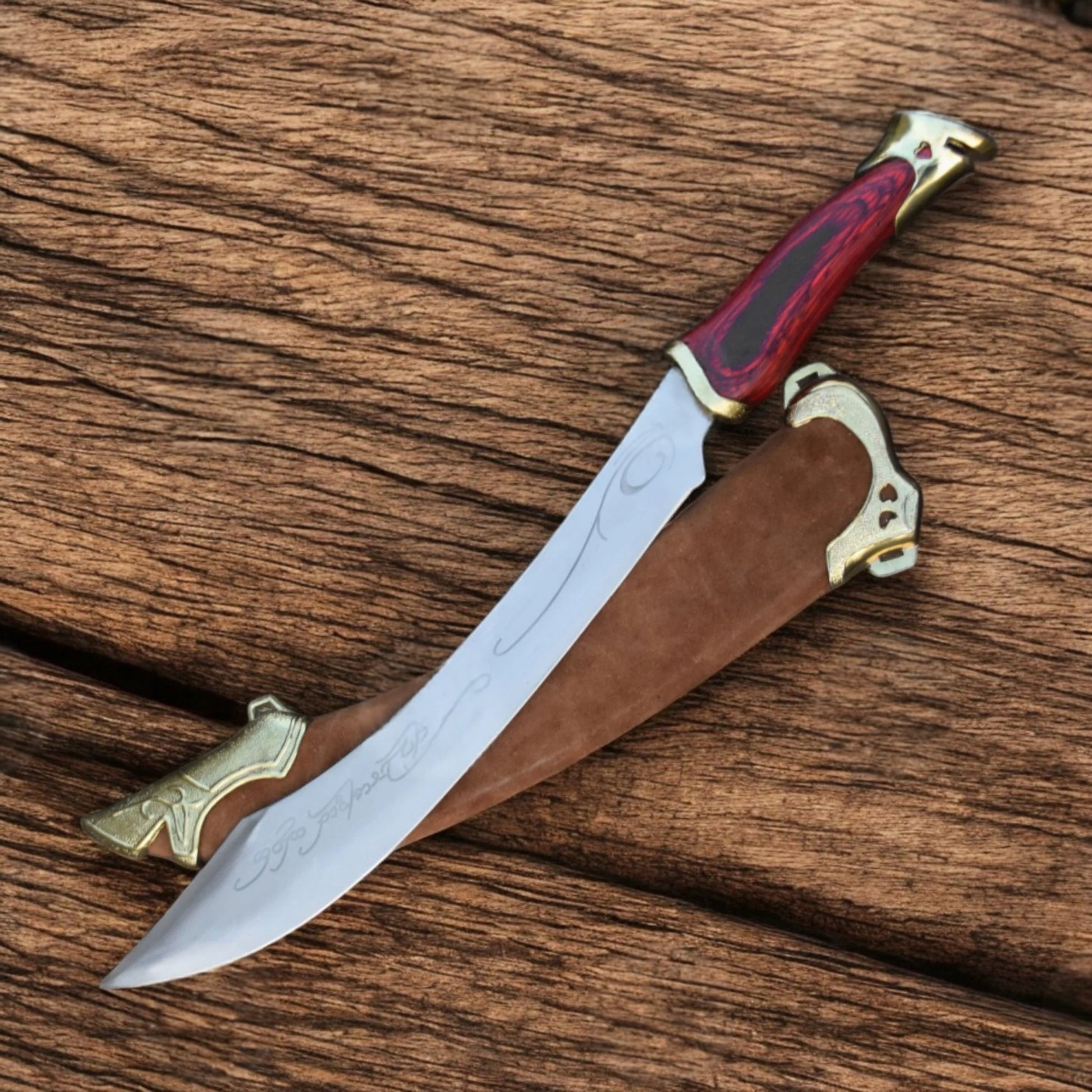 Strider Aragorn Elven knife replica from The Lord of the Rings featuring a detailed stainless steel blade and elegant Elven-style handle.