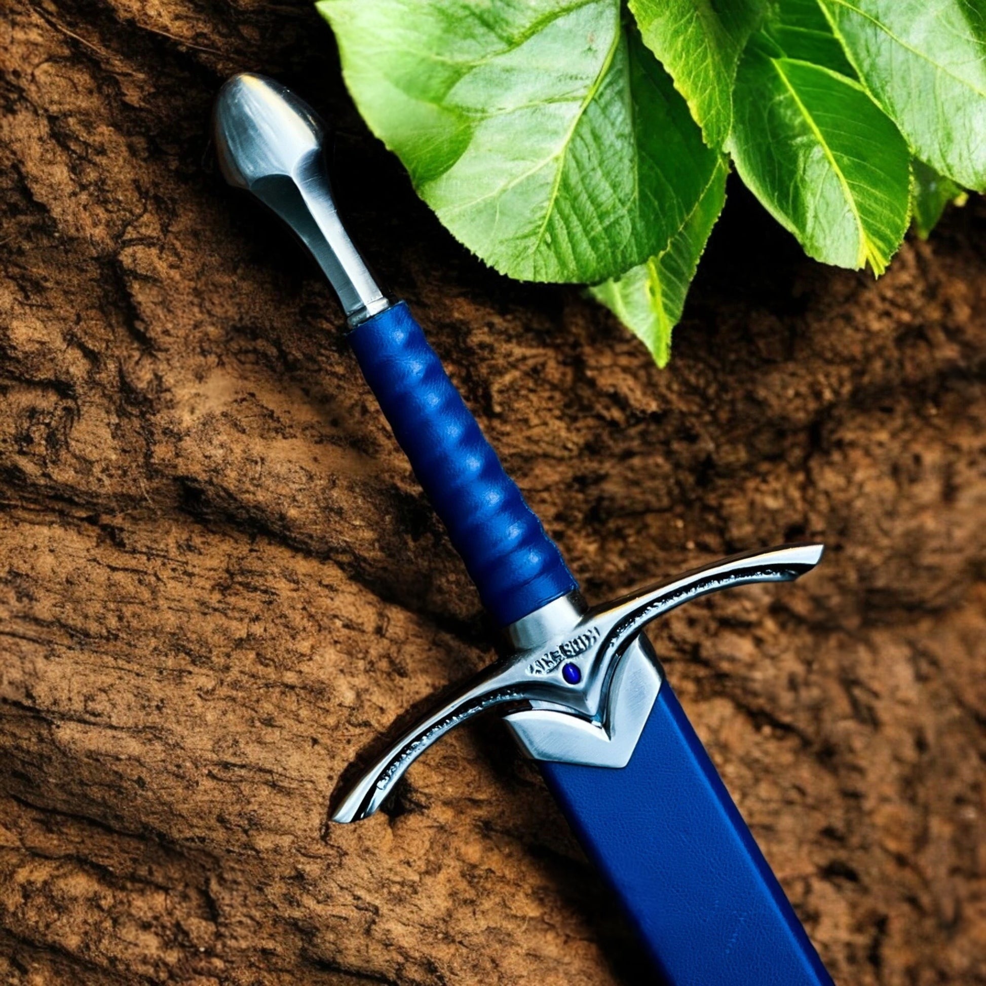 Glamdring sword replica from The Lord of the Rings featuring Gandalf's engraved Elven blade and ornate silver hilt.
