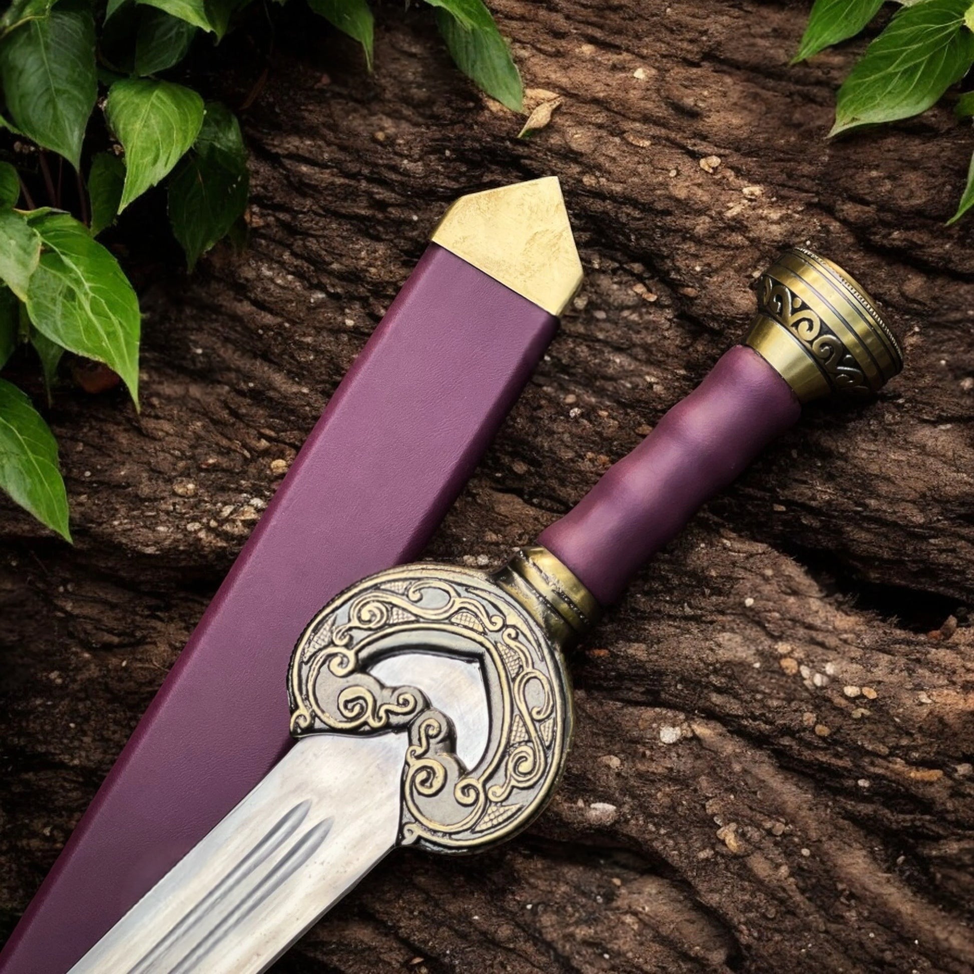 King Théoden's Herugrim movie sword replica from The Lord of the Rings featuring a detailed medieval-style blade and ornate hilt.