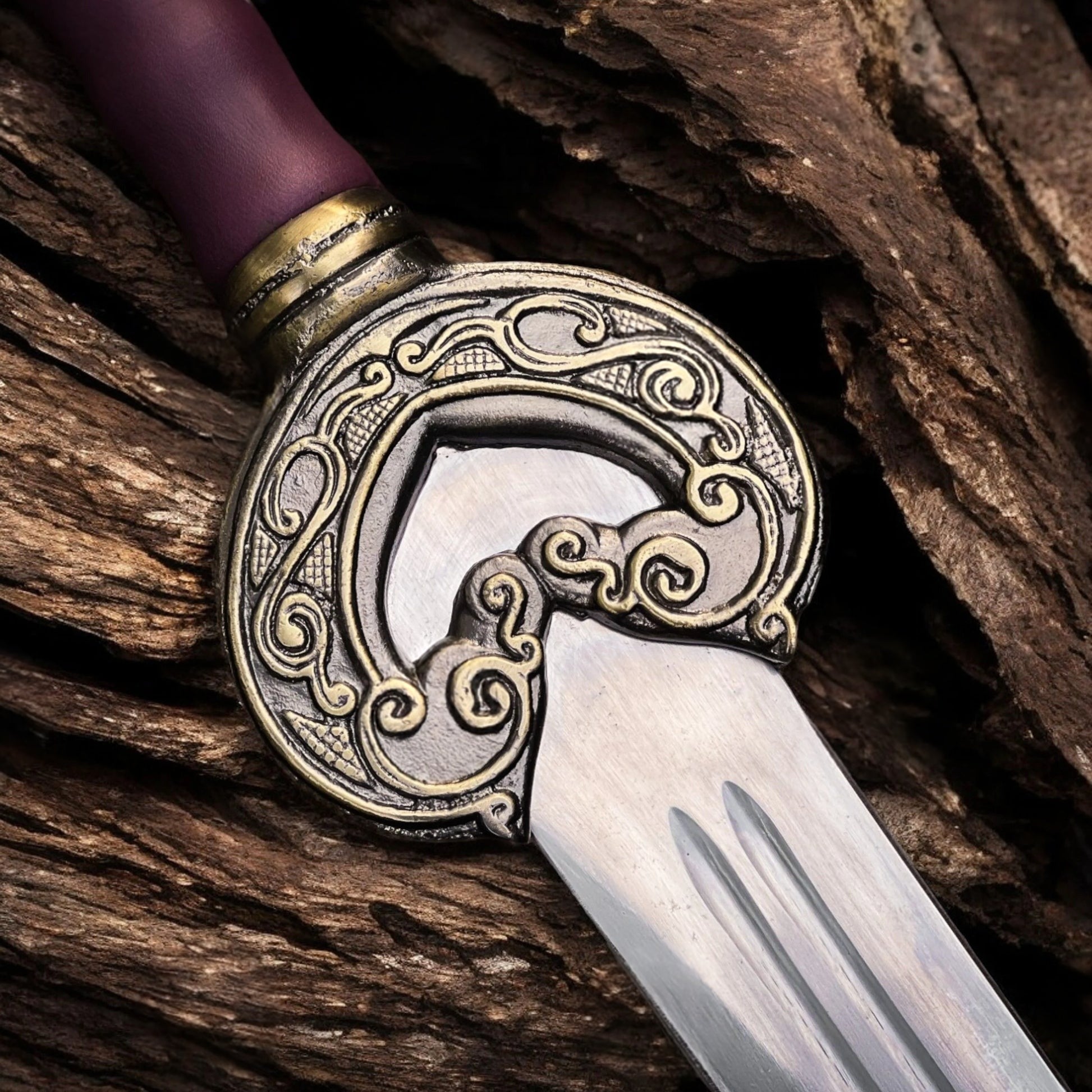 King Théoden's Herugrim movie sword replica from The Lord of the Rings featuring a detailed medieval-style blade and ornate hilt.
