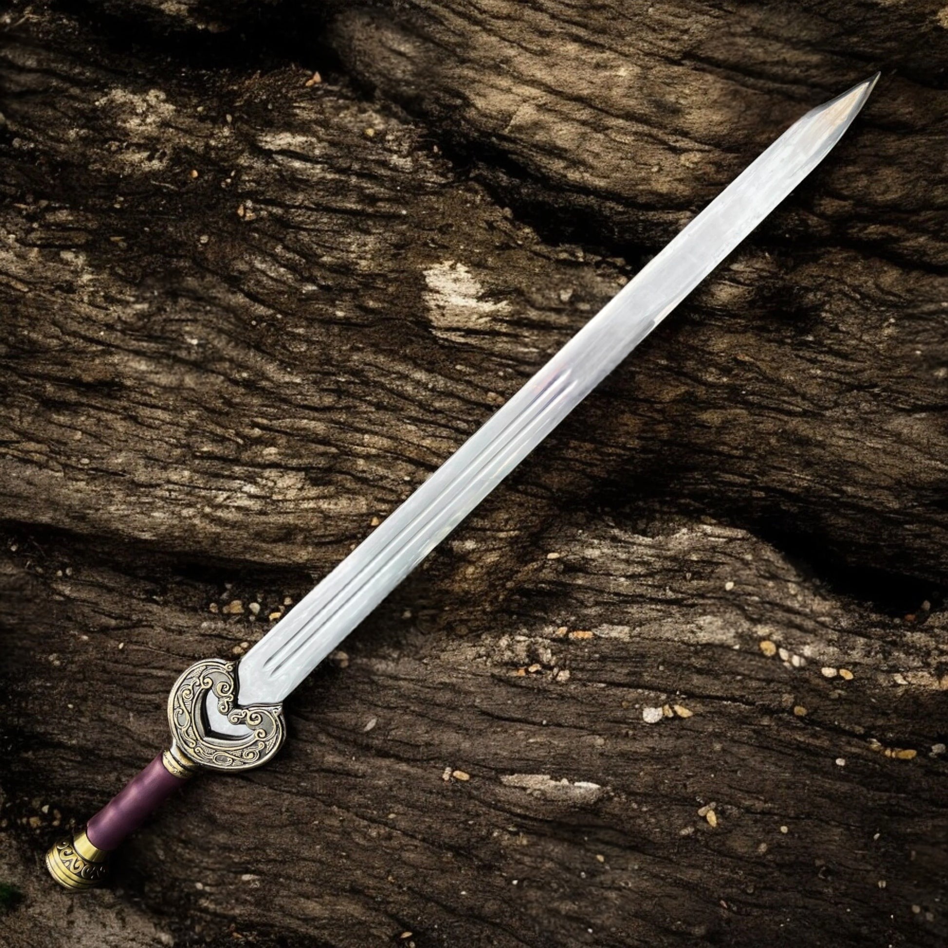 King Théoden's Herugrim movie sword replica from The Lord of the Rings featuring a detailed medieval-style blade and ornate hilt.